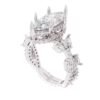 Side view of a silver marquise moissanite engagement ring with floral details